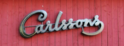 Carlssons butiksskylt i nrbild.